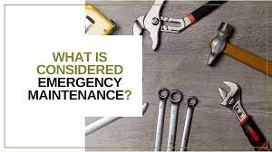 what is considered an emergency maintenance text with wrenches and other tools on a wood table 