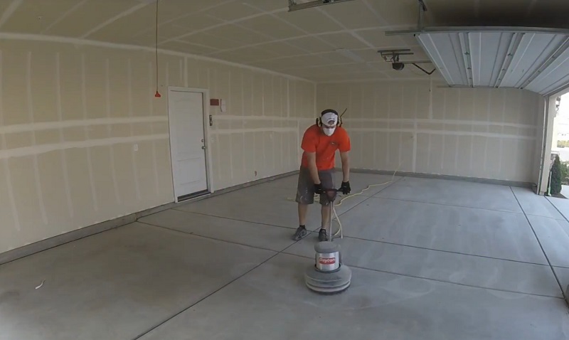 cleaning a garage floor in Pittsburgh PA to prepare it for a garage floor finiish installation