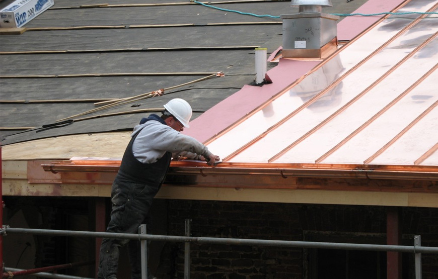 A seamed metal roof with concealed fasteners installed by Pit Pro Handyman in Pittsburgh Pennsylvania